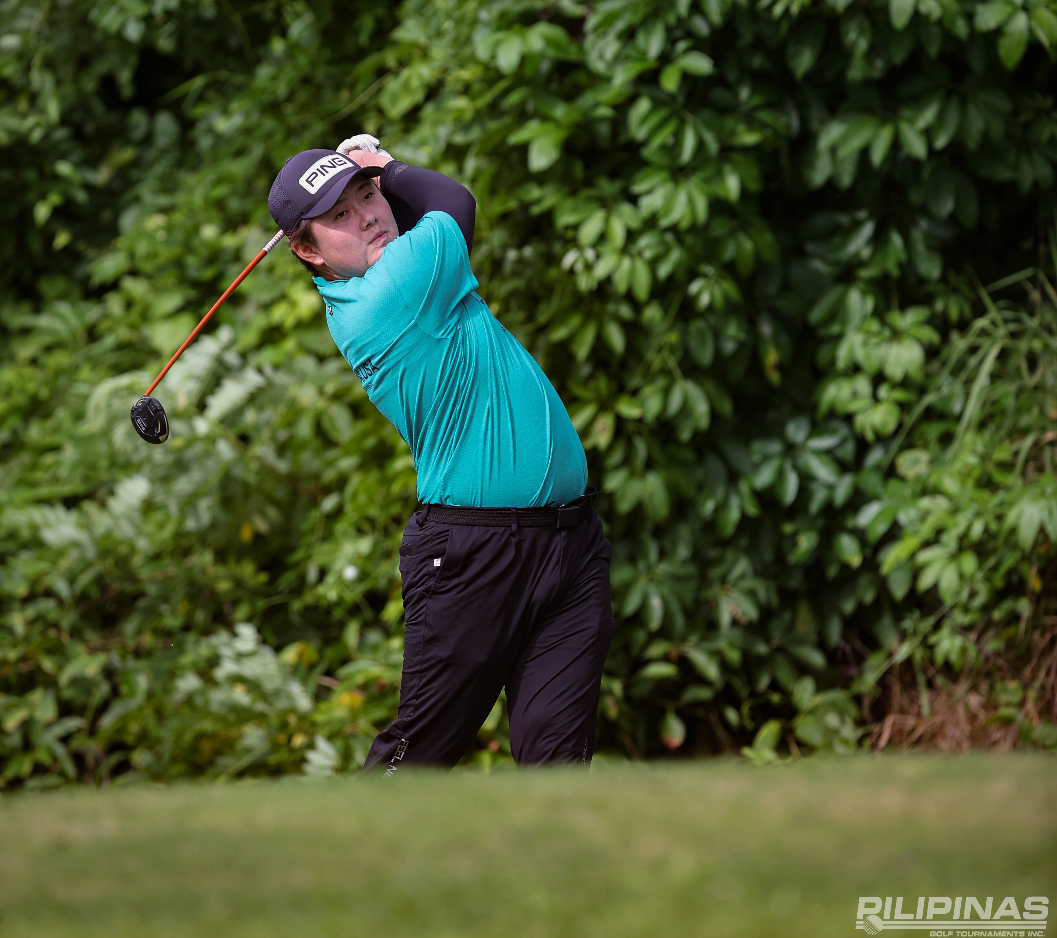 JAPANESE PRECISION: Late birdie gives Suzuki spot on top